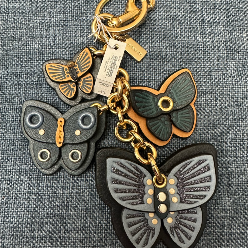Coach butterfly charm
